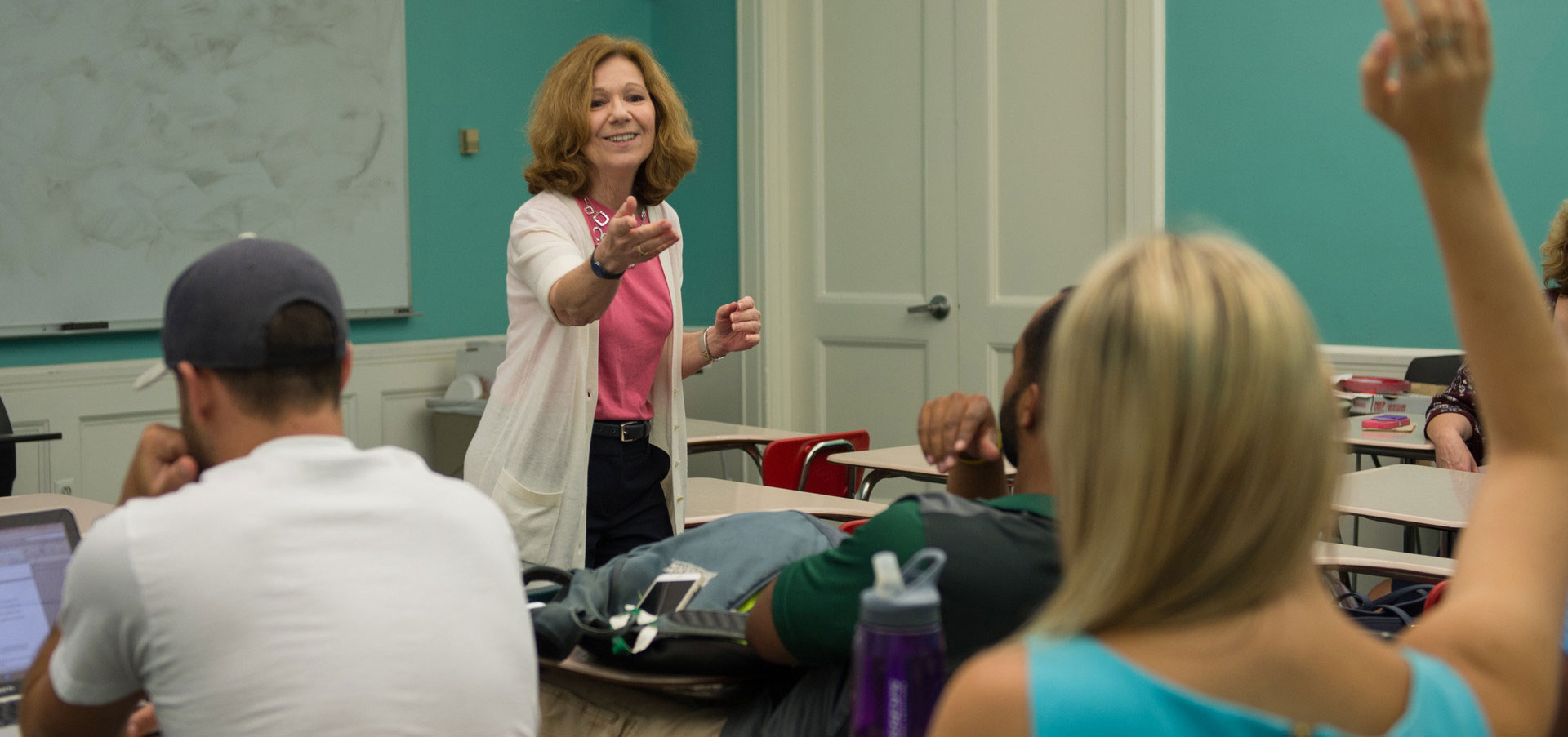 Michele Adams teaching students in classroom